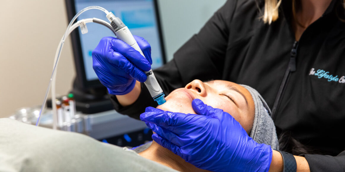 woman getting a hydra facial at the lifestyle center