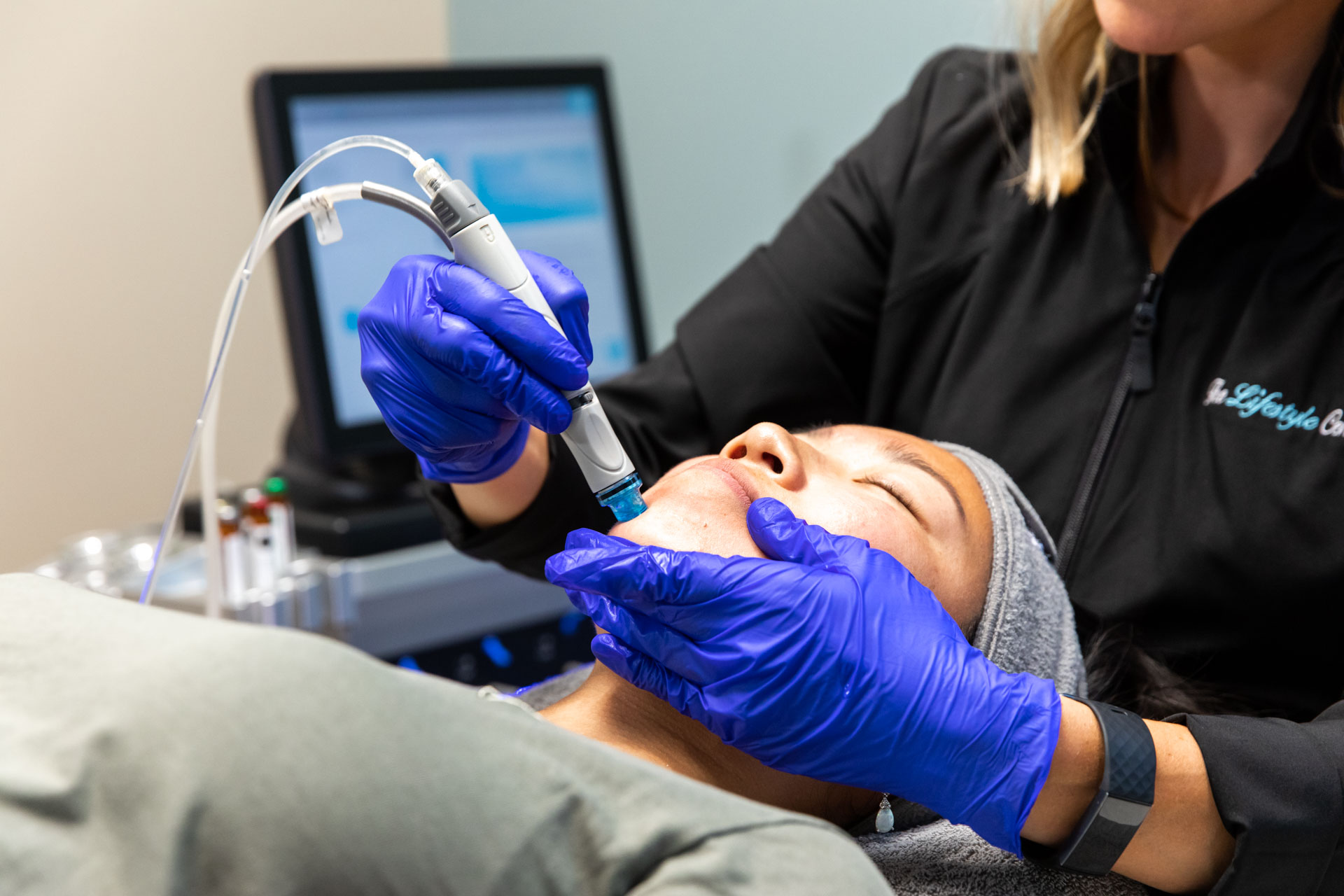 woman getting a hydra facial at the lifestyle center