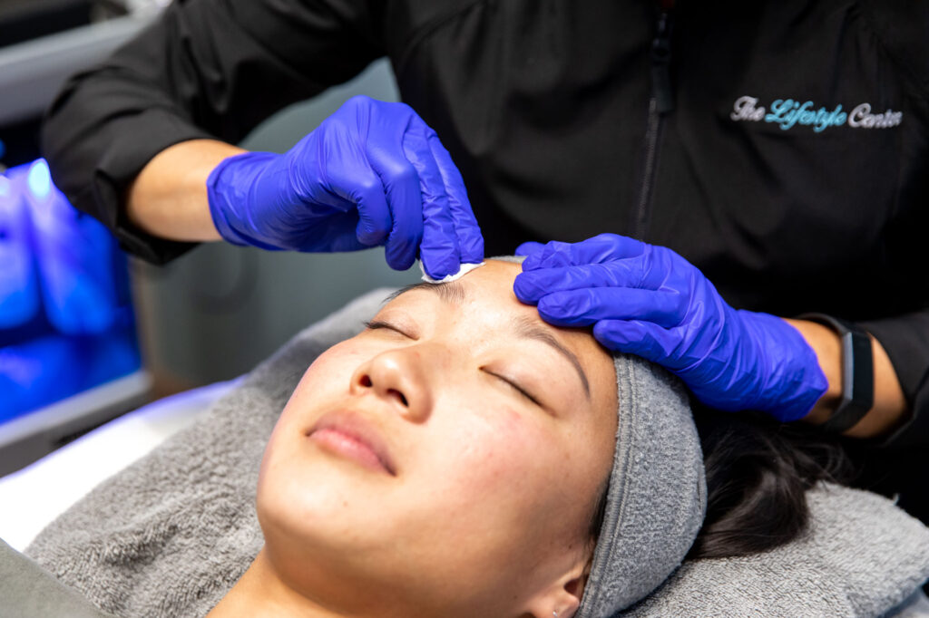 woman getting chemical peel at the lifestyle center