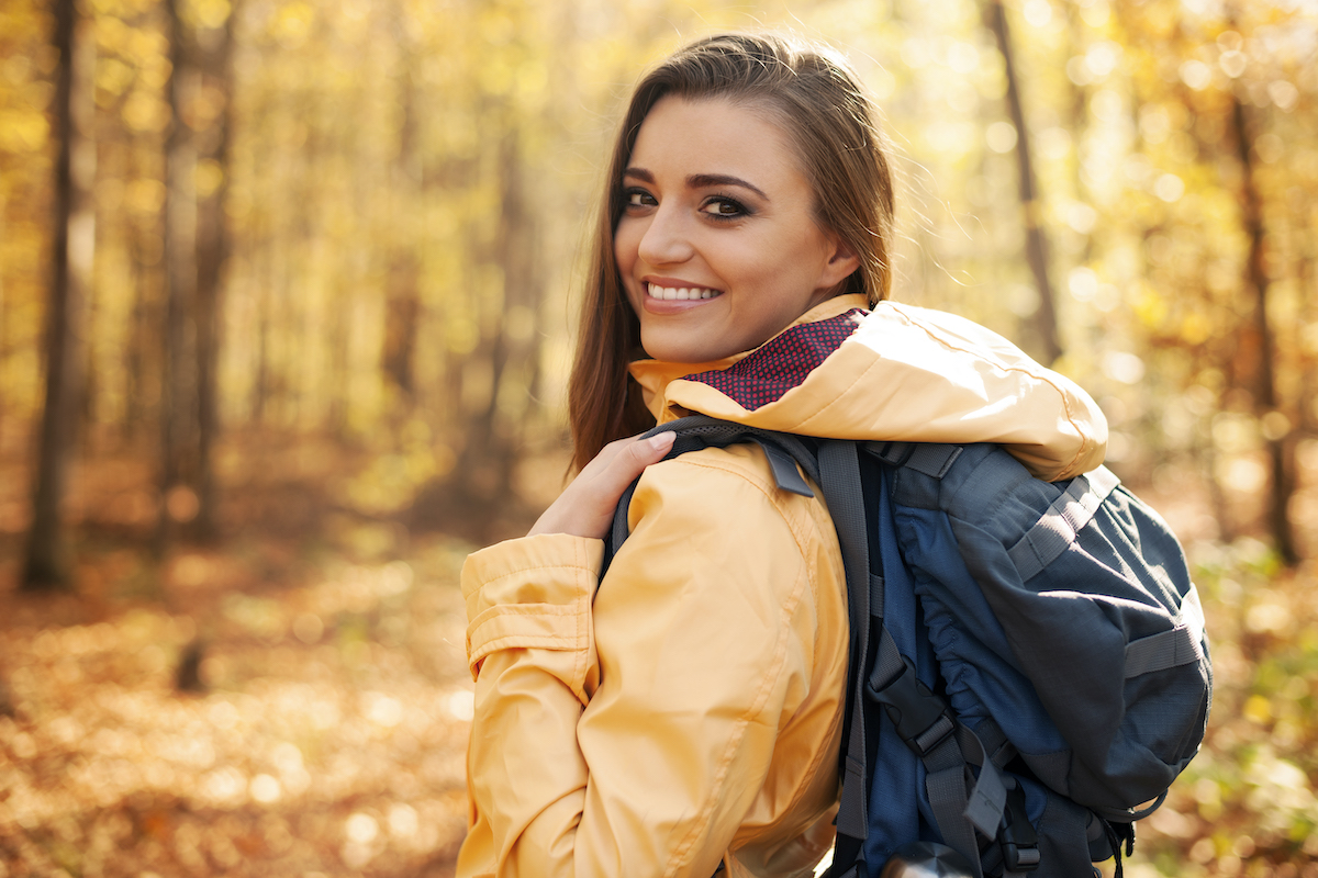 Portrait of beautiful and smiling female hiker