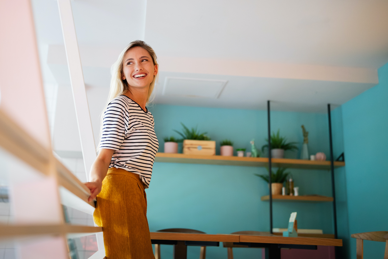 Portrait of beautiful young woman smiling and enjoying life