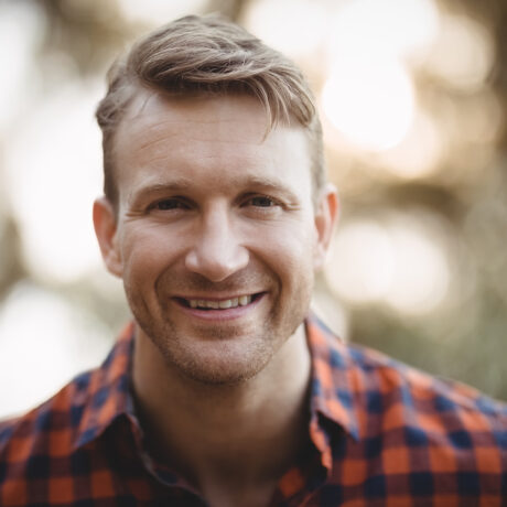 Portrait of smiling young man at farm