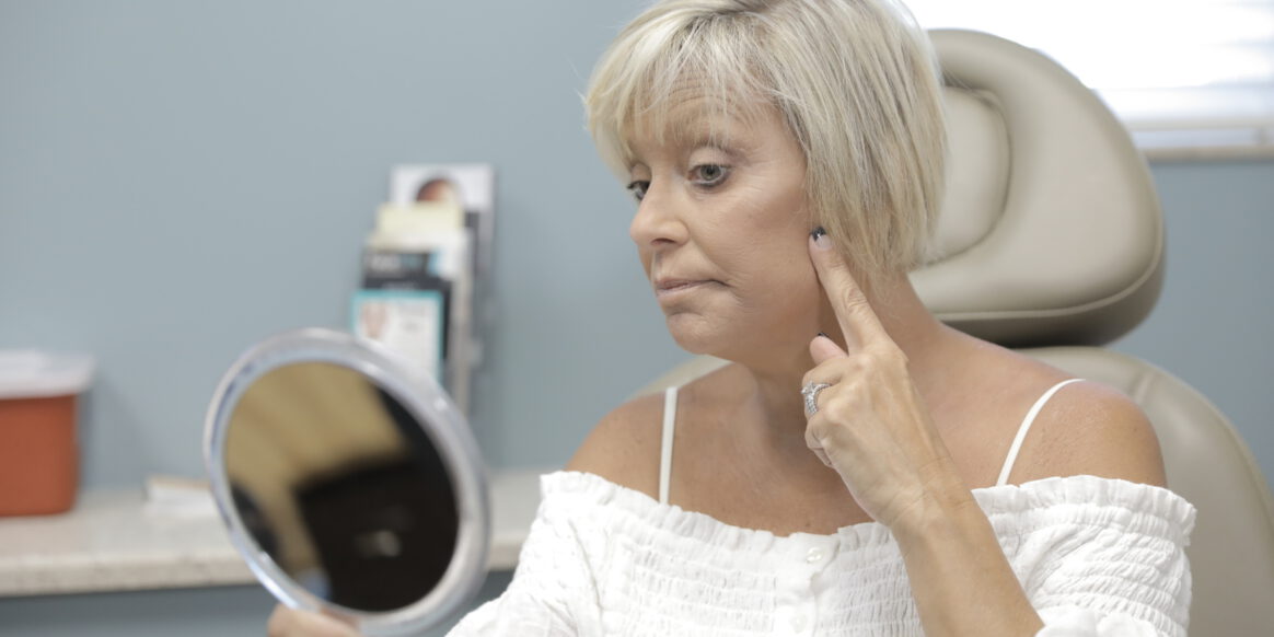 Woman looking at her fillers